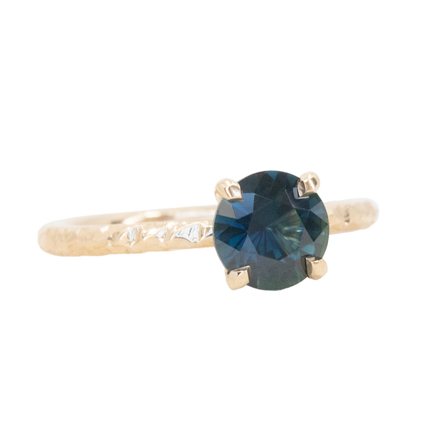 1.27ct Round Madagascar Blue Sapphire Evergreen Solitaire in 14K Yellow Gold side view