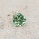 3.28CT MODIFIED TRILLION PEAR CUT MONTANA SAPPHIRE, GREEN YELLOW FLASHES OF TEAL, 8.9X9.7MM, UNTREATED