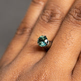 1.29CT ROUND BRILLIANT SONGEA SAPPHIRE, SPRING GREEN WITH TEAL, 6.44X4.22M, UNHEATED