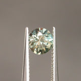 1.09CT ROUND BRILLIANT SONGEA SAPPHIRE, COLOR SHIFTING SOFT GREEN TO CHAMPAGNE, 6.00X4.20M, UNHEATED