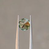 1.50CT ROUND PRECISION CUT MONTANA SAPPHIRE, LIGHT TEAL GREEN BLUE, 6.80X4.49MM