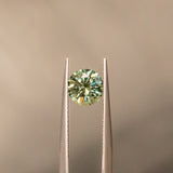 1.50CT ROUND PRECISION CUT MONTANA SAPPHIRE, LIGHT TEAL GREEN BLUE, 6.80X4.49MM