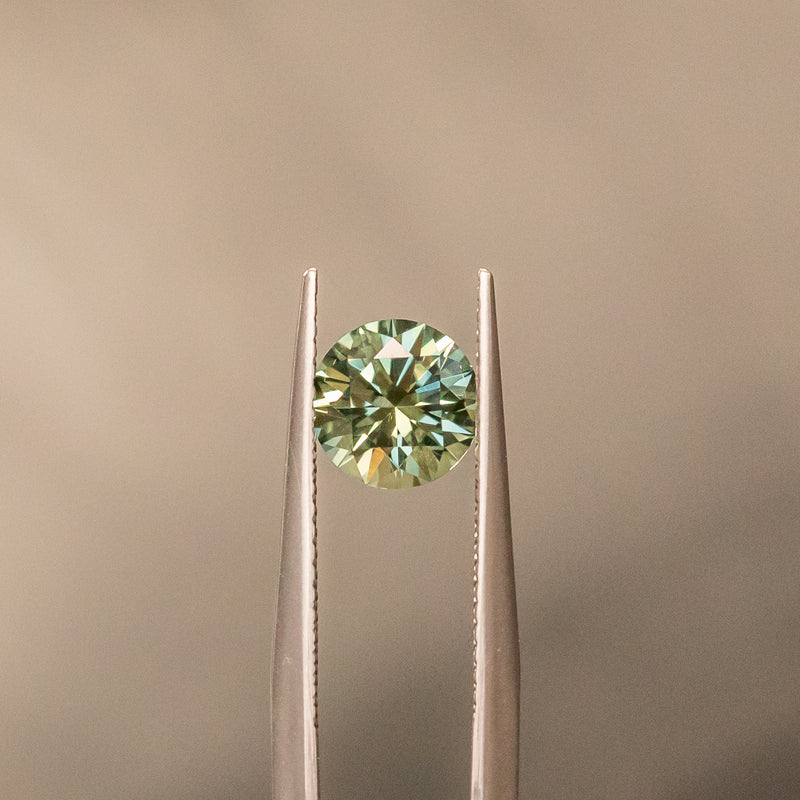 1.50CT ROUND PRECISION CUT MONTANA SAPPHIRE, LIGHT TEAL GREEN BLUE, 6.80X4.49MM