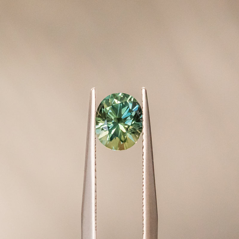 1.52CT OVAL PRECISION CUT MONTANA SAPPHIRE, LIGHT TEAL GREEN, 7.19X6.02MM