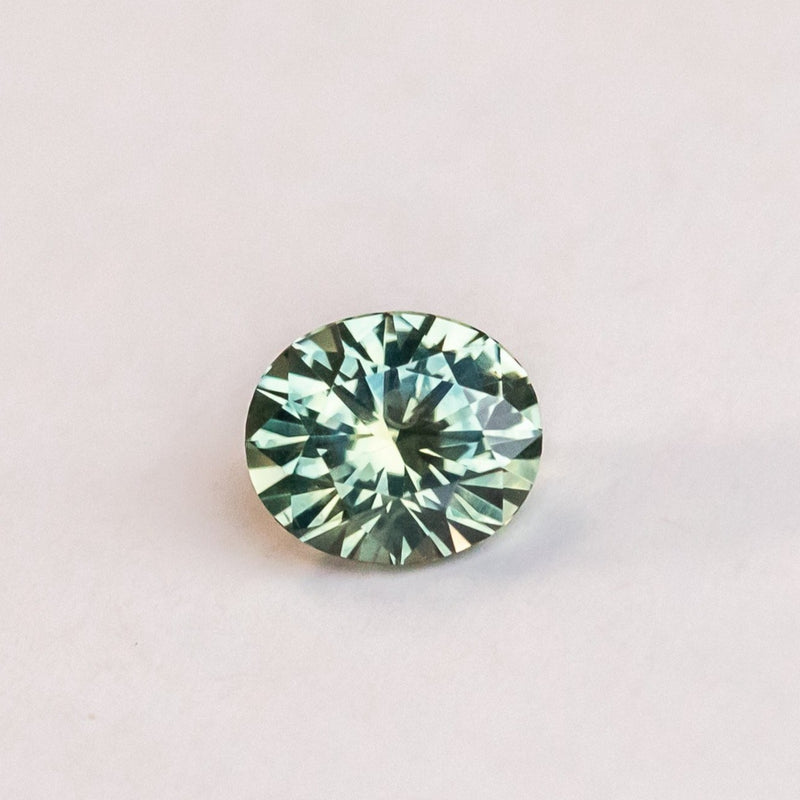 1.56CT OVAL PRECISION CUT MONTANA SAPPHIRE, MINTY TEAL GREEN, 7.38X6.31MM