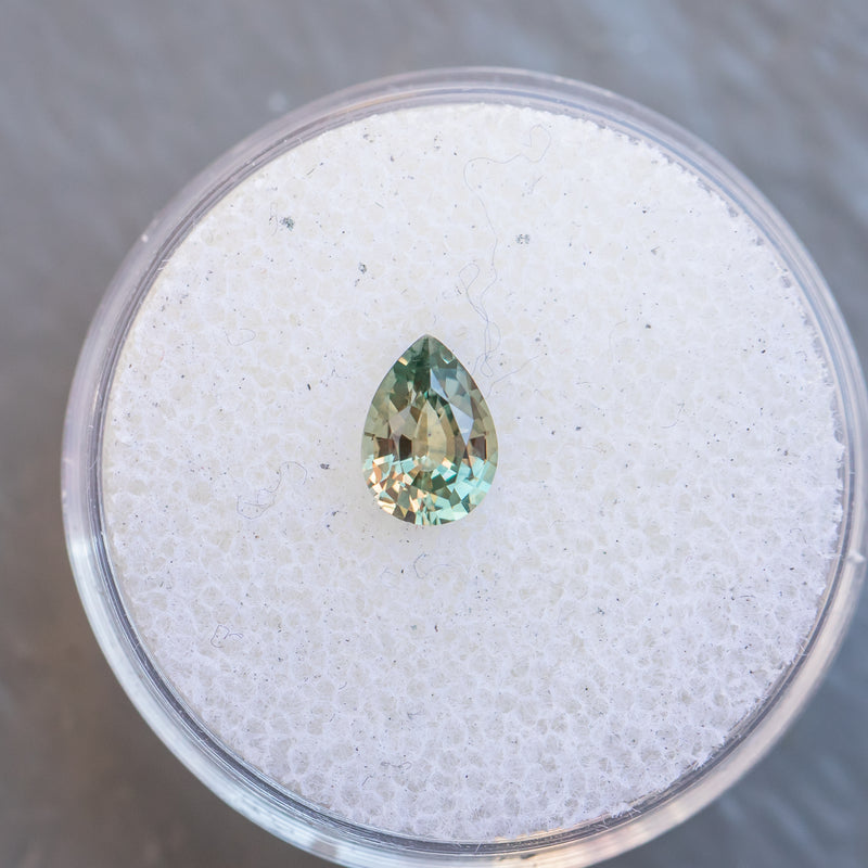 0.83CT PEAR MONTANA SAPPHIRE, COLOR SHIFTING GREEN TO PURPLE GREY, 6.99X5MM, UNTREATED