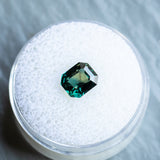 2.06CT EMERALD CUT MADAGASCAR SAPPHIRE, COLOR CHANGING DEEP TEAL TO PURPLE GREY, 7.4X6.32X4.28MM, UNTREATED