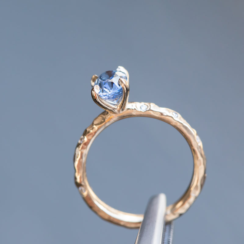 1.52ct Oval Blue Sapphire in 14k Yellow Gold Evergreen Solitaire with Scattered Embedded Diamonds