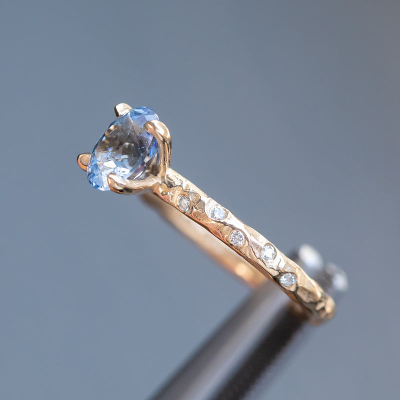 1.52ct Oval Blue Sapphire in 14k Yellow Gold Evergreen Solitaire with Scattered Embedded Diamonds