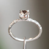 0.84ct Round Oregon Sunstone Solitaire Ring in Sterling Silver with Embedded Diamonds in Evergreen Texture