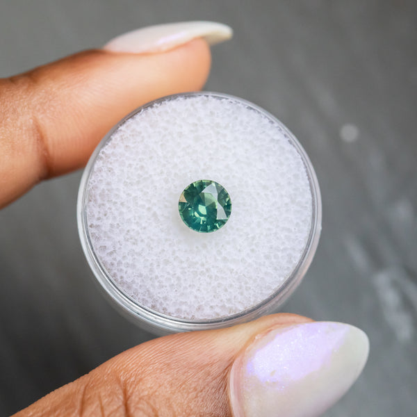 1.29CT AFRICAN ROUND SAPPHIRE, CHARTREUSE GREEN, 6.43X4.05MM, HEATED