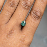 1.29CT AFRICAN ROUND SAPPHIRE, CHARTREUSE GREEN, 6.43X4.05MM, HEATED