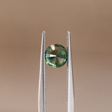 1.21CT AFRICAN ROUND SAPPHIRE, MOSS GREEN - YELLOW FLASHES, 6.16X4.58MM, HEATED