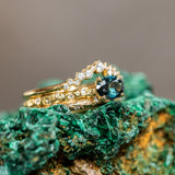 0.85ct Oval Sapphire in 14k Yellow Gold Evergreen Solitaire with Scattered Embedded Diamonds