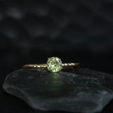 0.67ct Round Green Garnet Evergreen Solitaire in 14k Yellow Gold