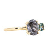 1.52ct Grey Oval Diamond and 0.28ct Round Montana Sapphire Ring in 14k Yellow Gold