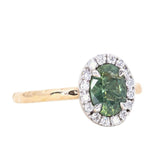 1.20ct Silky Oval Green Madagascar Sapphire and Diamond Four Prong Halo Ring in 14K White Gold Halo and 14k Yellow Gold Shank