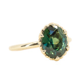 3.17ct Teal Oval Madagascar Sapphire Scallop Cup Sapphire Solitaire in 14K Yellow Gold side view