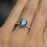 3.18ct Round Periwinkle Sapphire Solitaire with Diamonds in Platinum on hand