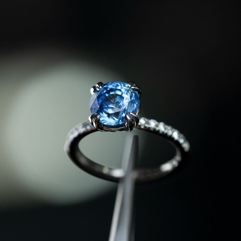 3.18ct Round Periwinkle Sapphire Solitaire with Diamonds in Platinum in tweezers