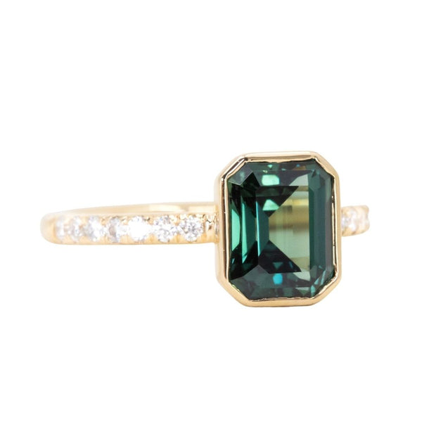 3.05ct Emerald Cut Color Shifting Teal Blue Green Sapphire Low Profile Bezel with French Set Diamonds 18k Yellow