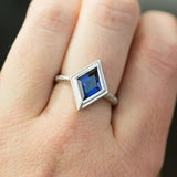 Kite Shaped Purple Blue Iolite in Evergreen Carved 18k White Bezel with satin finish