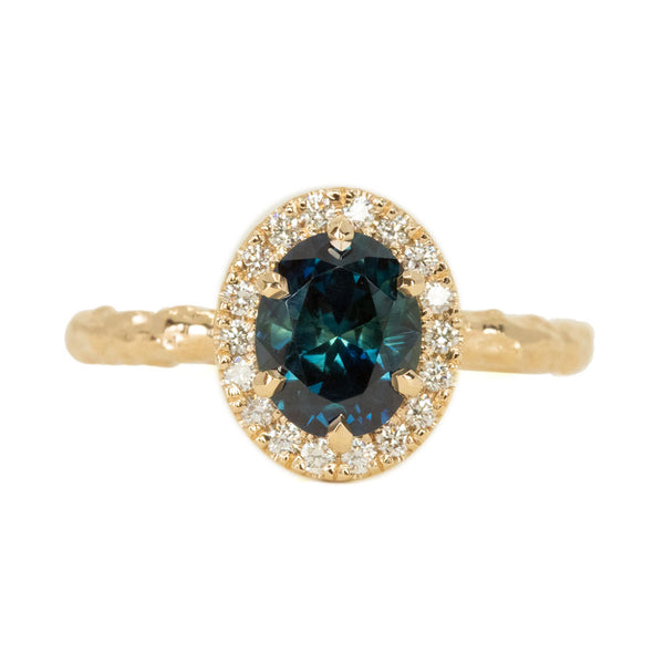 1.63ct Oval Deep Blue Unheated Sapphire and Diamond Six Prong  Halo Evergreen Ring in 14k Yellow Gold