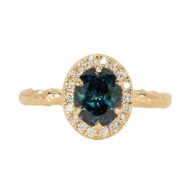 1.63ct Oval Deep Blue Unheated Sapphire and Diamond Six Prong  Halo Evergreen Ring in 14k Yellow Gold