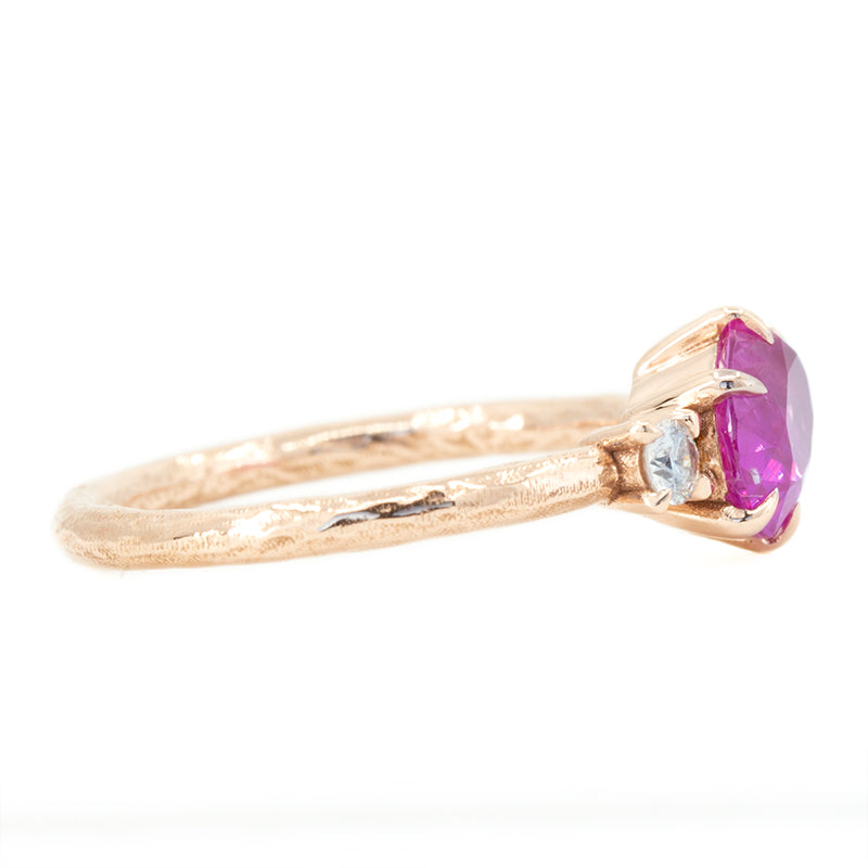 1.61ct Oval Neon Pink Sapphire and Diamond Asymmetrical Ring in 14k Rose Gold side angle
