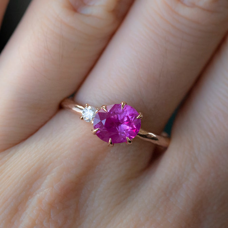 1.61ct Oval Neon Pink Sapphire and Diamond Asymmetrical Ring in 14k Rose Gold on hand