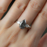 2.10ct Pear Deep Grey Salt And Pepper Diamond Three Stone Ring with White Diamond Sides in 14k White Gold