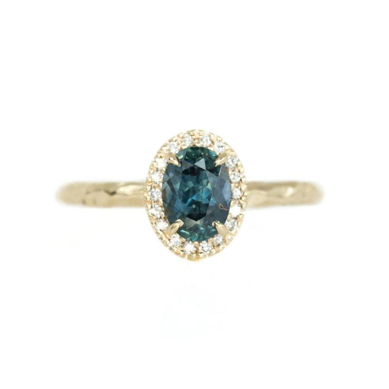 1.04ct Blue Montana Sapphire in 14k Yellow Gold Evergreen Diamond Halo