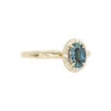 1.04ct Blue Montana Sapphire in 14k Yellow Gold Evergreen Diamond Halo