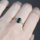 1.60ct Deep Teal Oval Sapphire Ring in Yellow Gold Evergreen 4 Prong Solitaire
