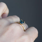 1.60ct Deep Teal Oval Sapphire Ring in Yellow Gold Evergreen 4 Prong Solitaire