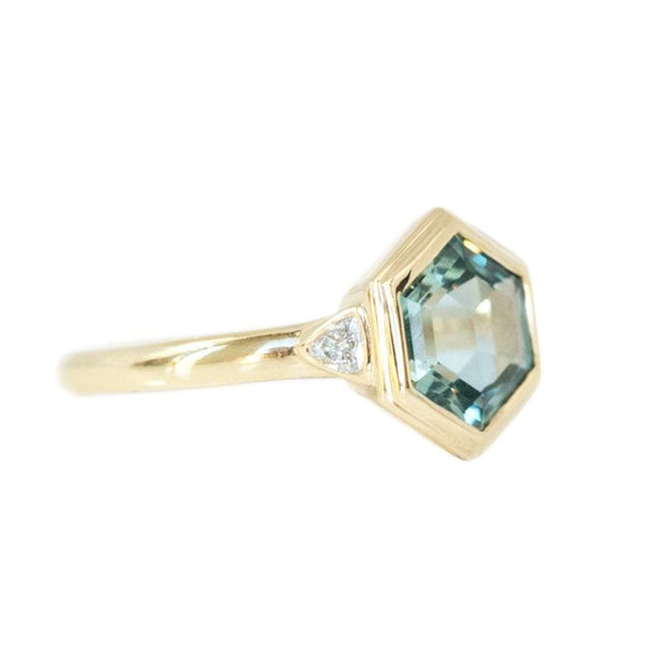 2.61ct Montana Sapphire Hexagon Ring Bezel Set with Trillion side diamonds in yellow gold
