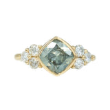 Minty Cushion Cut Sapphire Ring with Diamond Cluster Side Stones in Bezel Yellow Gold