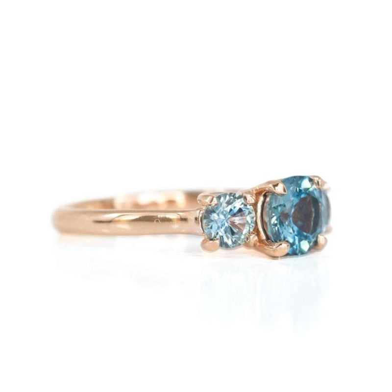 Three Stone Montana Sapphire Ring with 1.27ct Blue Center in 14k Rose Gold