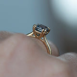 2.43ct Radiant Cut Periwinkle Blue Grey Sapphire in a Double Prong Cathedral Solitaire In 14k Yellow Gold