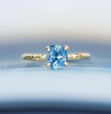 1.34ct Oval Watercolor Blue Sapphire Engagement Ring in 14k Yellow Gold Evergreen Solitaire