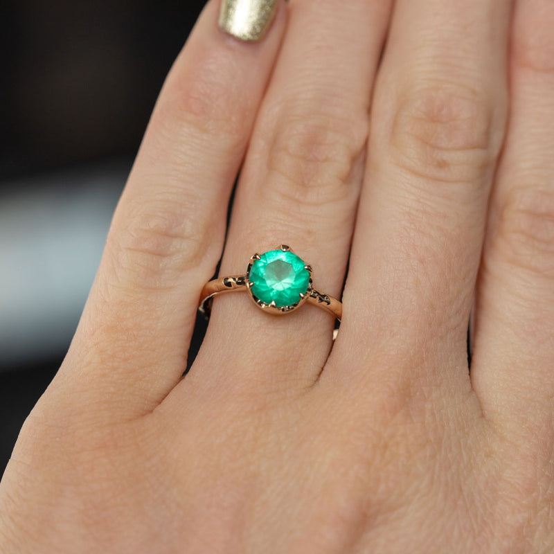 Neon Emerald Low Profile Six Prong Antique Evergreen Solitaires in 14k Yellow and Rose Gold on hand