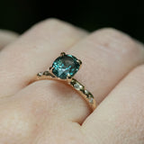 1.79ct Oval Blue Color Changing Sapphire in 14k Yellow Gold Evergreen Solitaire with Scattered Embedded Diamonds