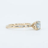 Grey Moissante and Scattered Diamond Solitaire in 14k Yellow Gold side view