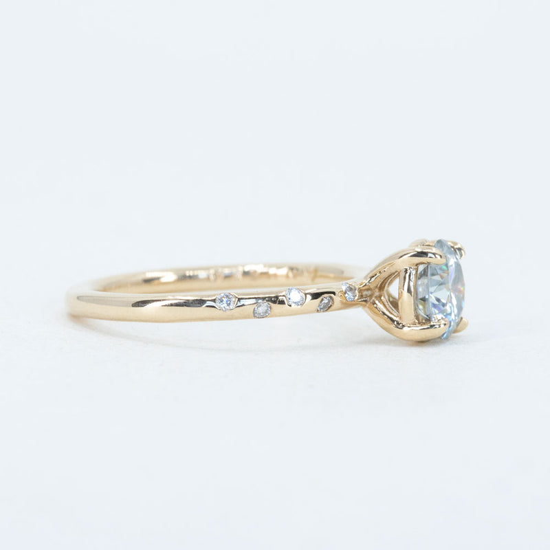 Grey Moissante and Scattered Diamond Solitaire in 14k Yellow Gold side view