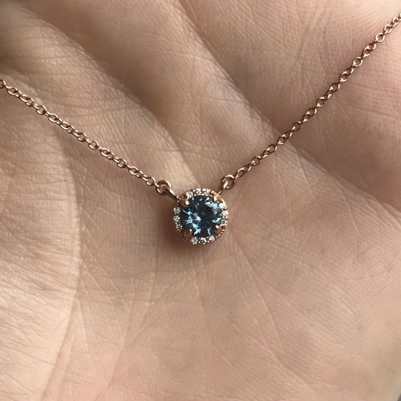 0.52ct Montana Sapphire and diamond halo necklace in 14k rose gold