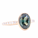 3.23ct Oval Color-Shifting Sapphire Bezel with French Set Diamonds in 18k Rose Gold