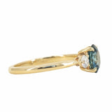 1.54ct Oval Montana Sapphire and Diamond Three Stone Ring in 14k Yellow Gold side angle