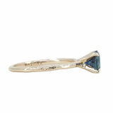 1.03ct Round Blue Australian Sapphire Evergreen Solitaire in 14k Yellow Gold side profile