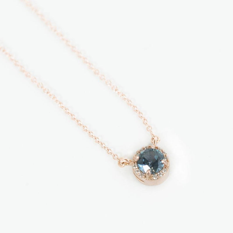 0.52ct Montana Sapphire and diamond halo necklace in 14k rose gold
