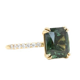 4.52ct Forest Green Radiant Cut Sapphire Double Claw Prong Solitaire with Diamonds in 14k Yellow Gold side angle